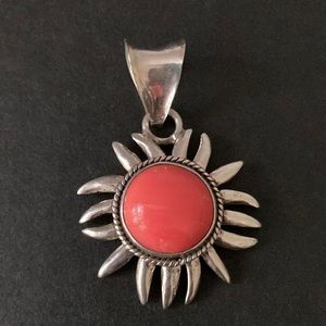 Sterling silver pendant with coral stone